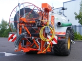 Drain flusher mounted on rear of water bowser